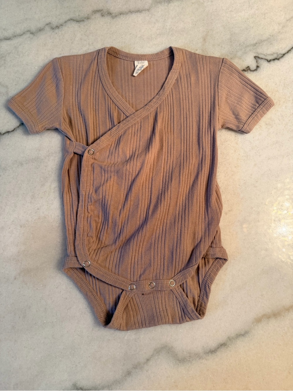 Kate Quinn body suit